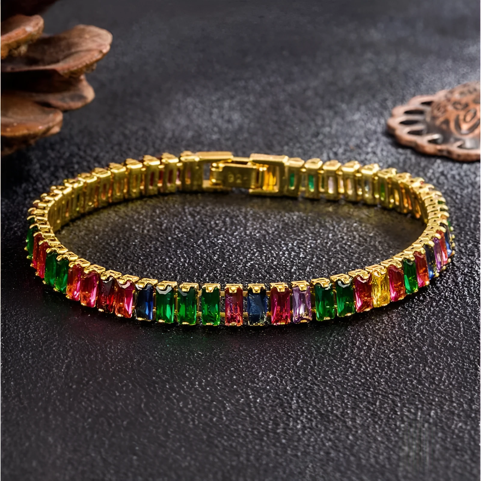 Women's simple diamond studded bracelet in gold finish with 4mm band width on white background