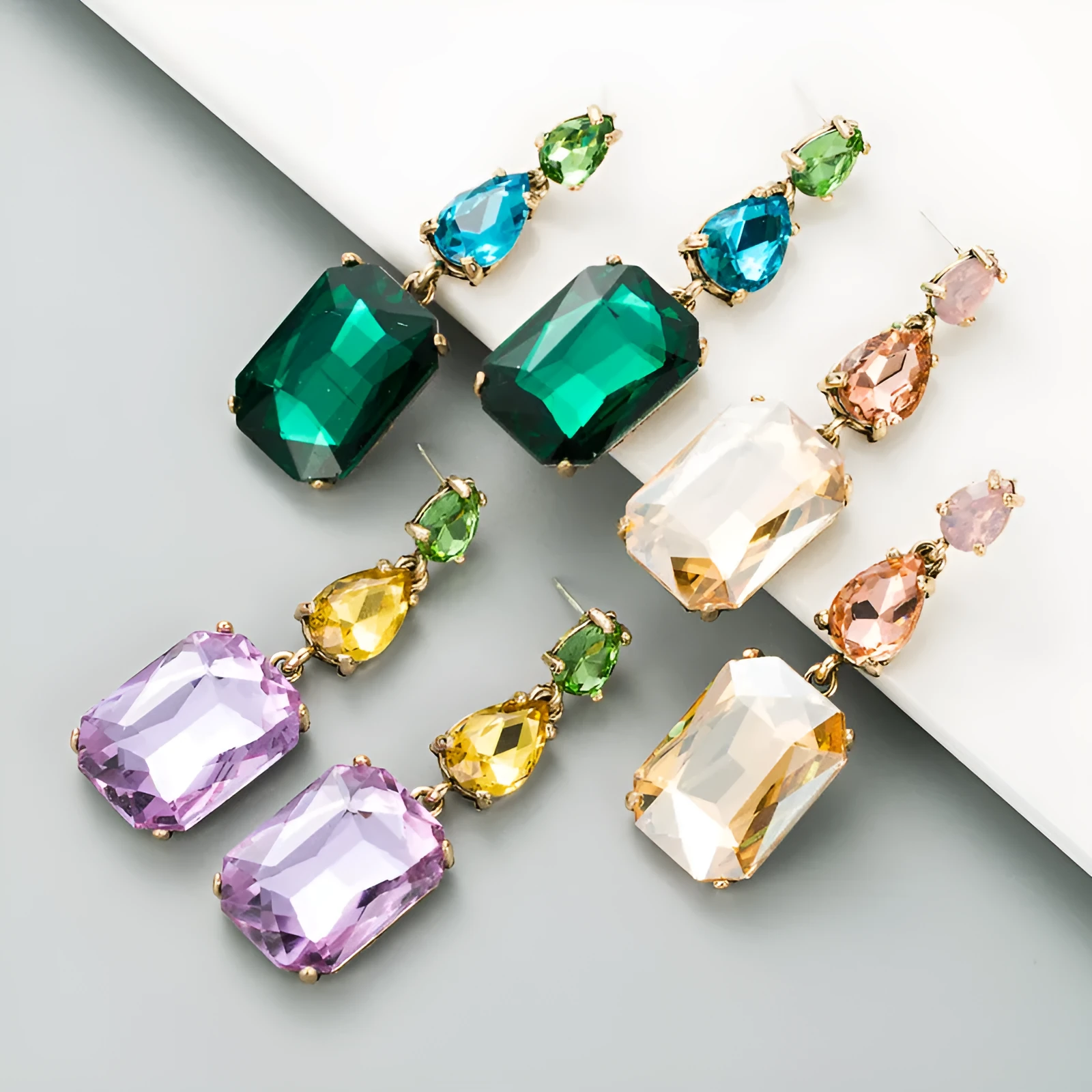 Pair of minimalist rhinestone geometric earrings in round shape, available in purple, green, or brown, European American fashion style.