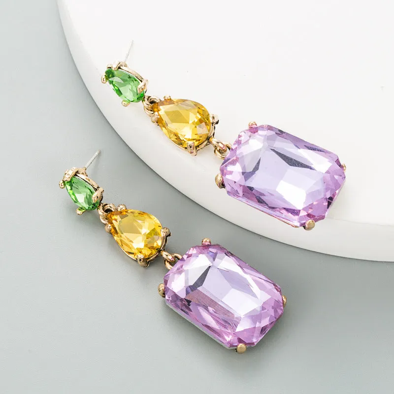Pair of minimalist rhinestone geometric earrings in round shape, available in purple, green, or brown, European American fashion style.