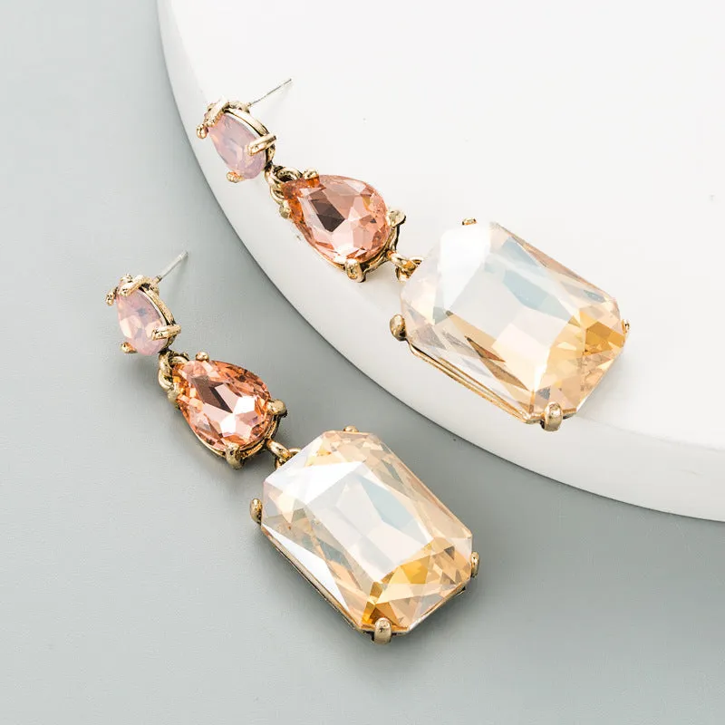 Pair of minimalist rhinestone geometric earrings in round shape, available in purple, green, or brown, European American fashion style.