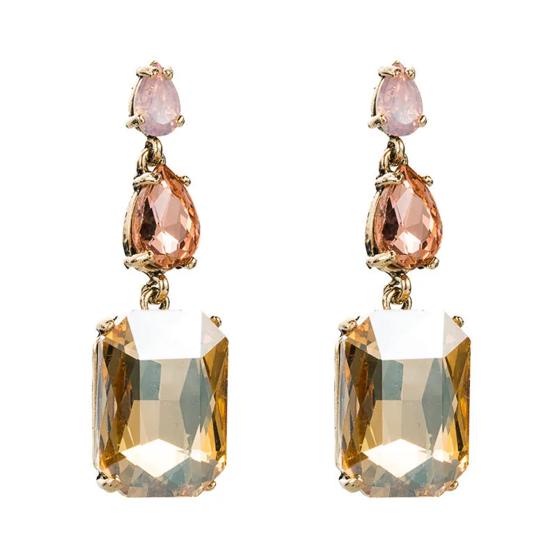 Pair of minimalist rhinestone geometric earrings in round shape, available in purple, green, or brown, European American fashion style.