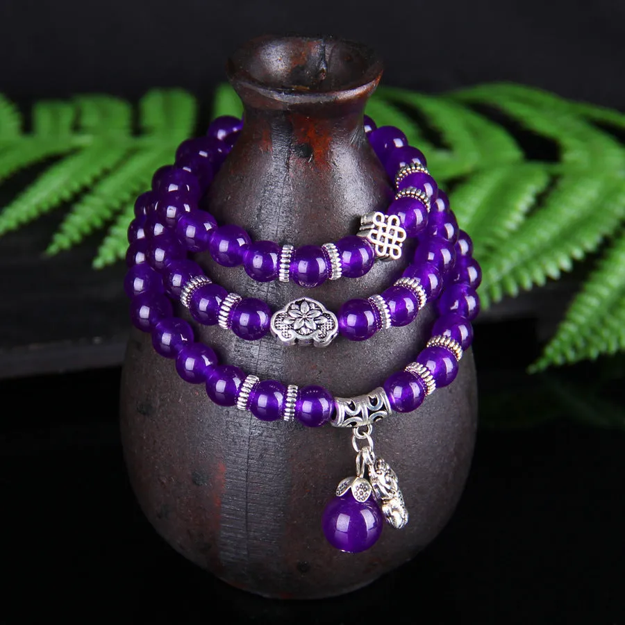 Purple ethnic-style women's bracelet with three circles of polished chalcedony beads on an adjustable band.