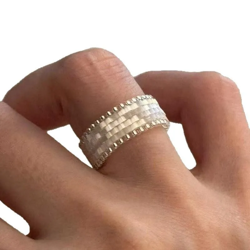Handmade glass bead string ring in retro Korean style with inspiration Muse filament design
