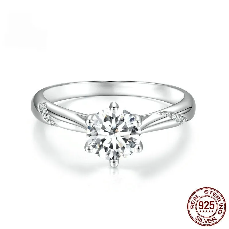Silver moissanite ring with 1 karat main stone, electroplated finish, size US7 on a white background.
