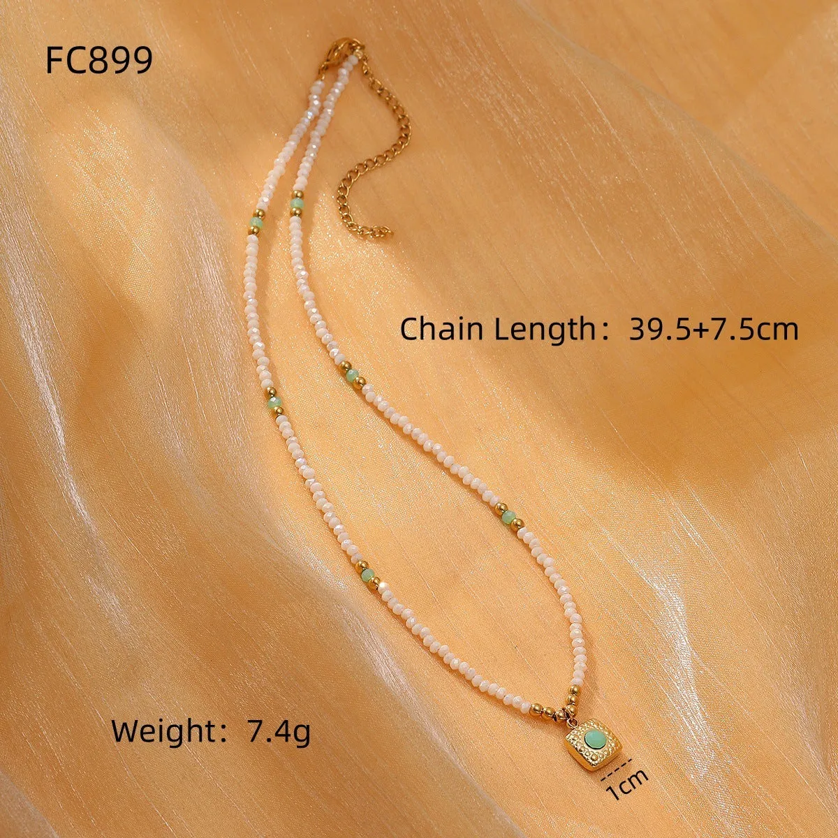 Women's sunflower colour crystal bead necklace with rhodochrosite accents, stainless steel chain, and 18K gold-plated geometry pendant.