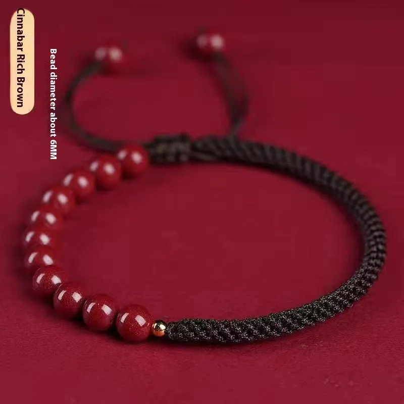 Braided rope bracelet with cinnabar beads in 8mm diameter and wine red colour