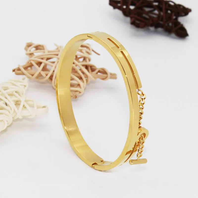 Geometric titanium steel bracelet in rose gold electroplated finish on white background
