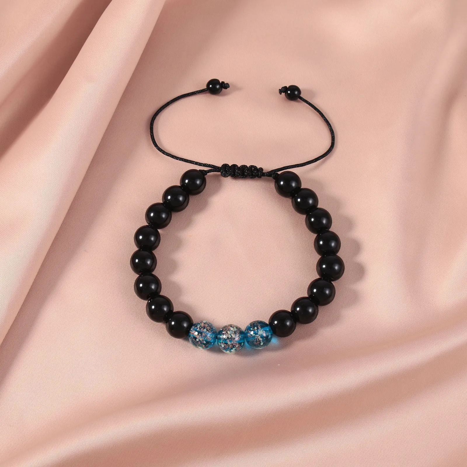 Adjustable luminous bracelet with coloured glass geometry beads in six colour options