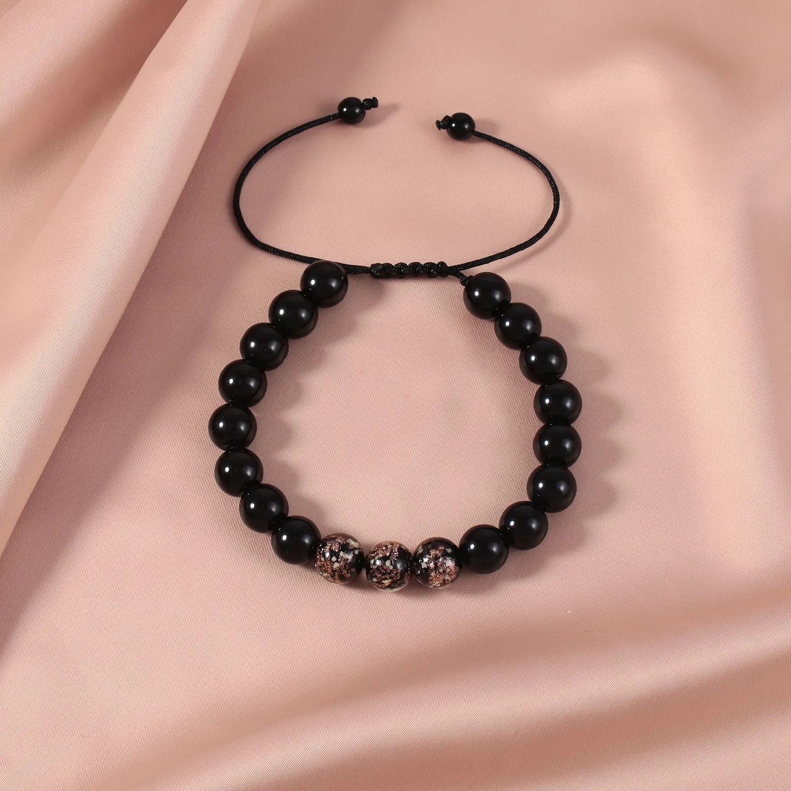 Adjustable luminous bracelet with coloured glass geometry beads in six colour options