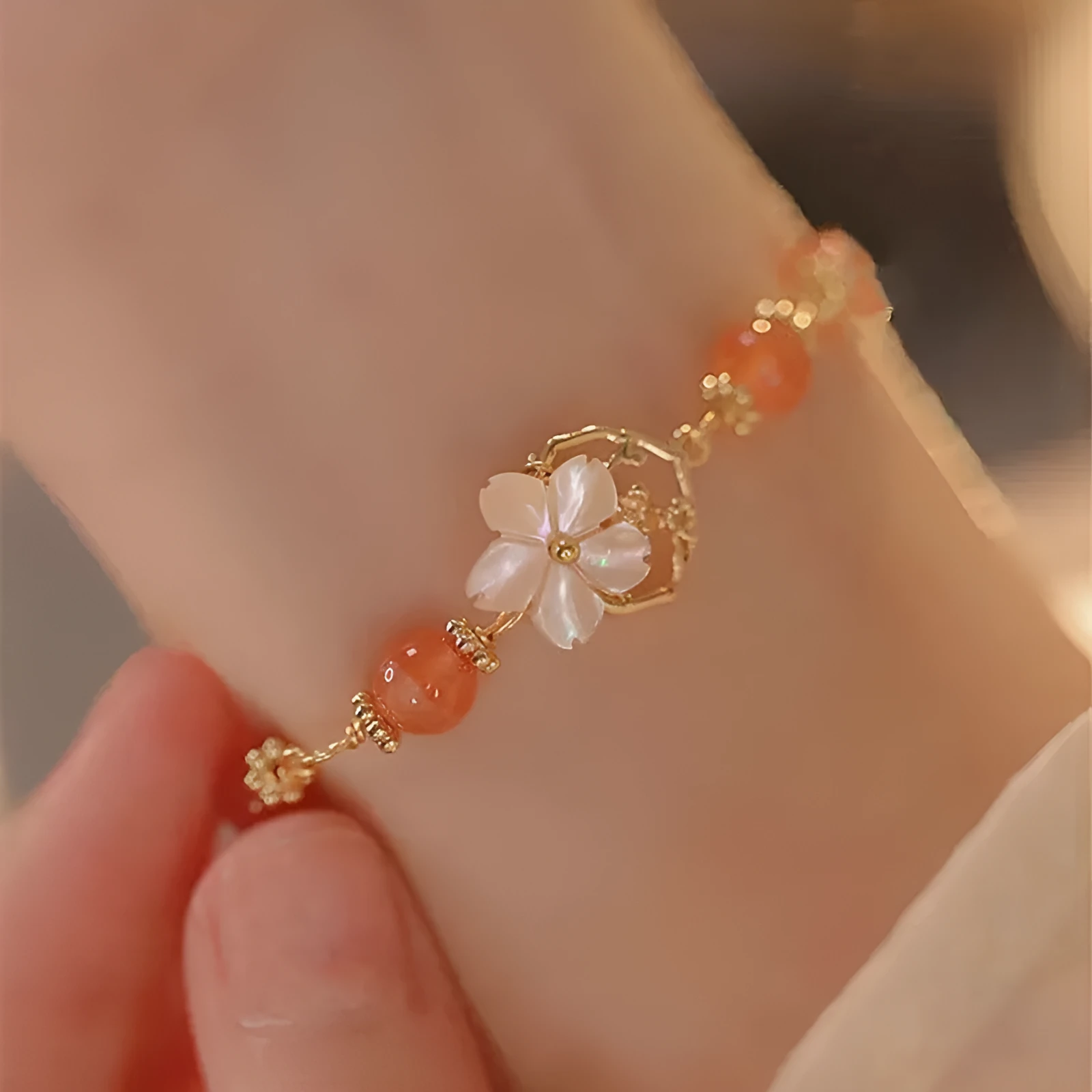Redgusset alloy bracelet with five-pointed star charm on wrist
