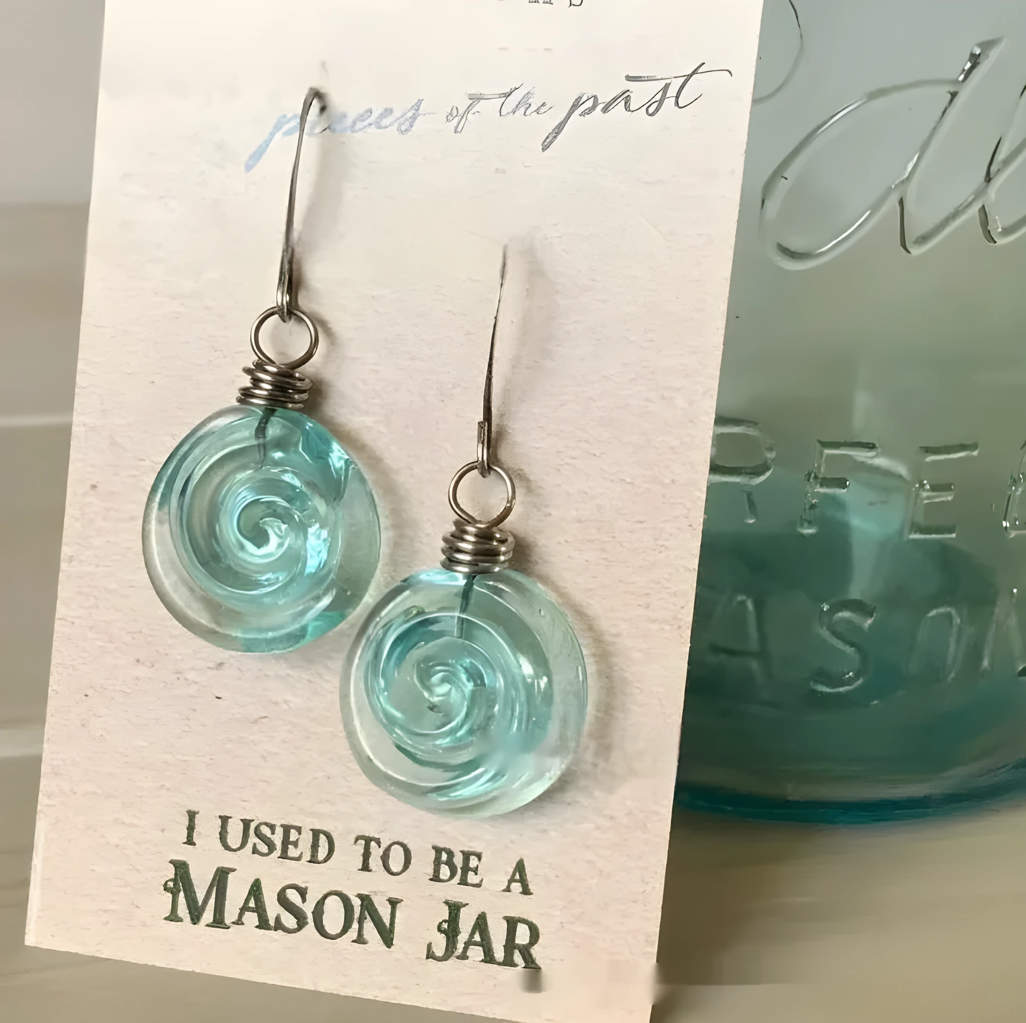 Recycling Glass Spiral Earrings in resin plus metal with electroplated finish