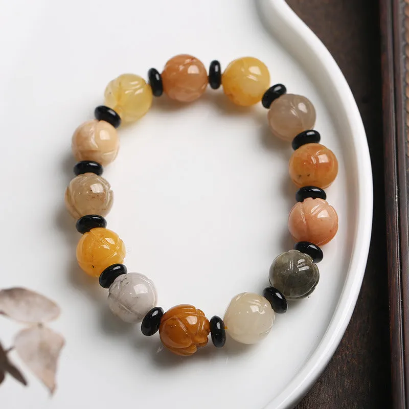 Hetian natural Jinsi jade pumpkin beads bracelet with lotus beads in 10mm size on white background