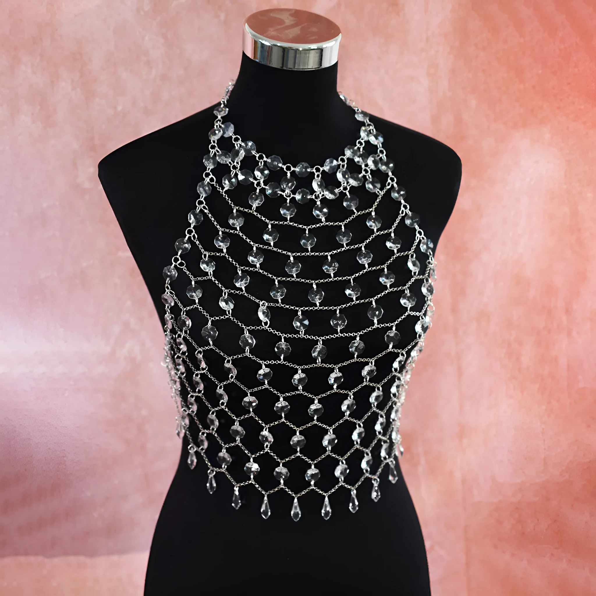 Transparent acrylic crystal body chain with hand-woven plastic and resin sequins in round shapes