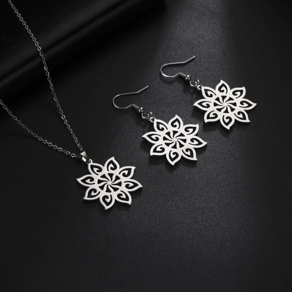 Stainless steel eight-petal flower necklace and earring set with titanium steel pendant on O-ring chain, steel colour electroplated finish.