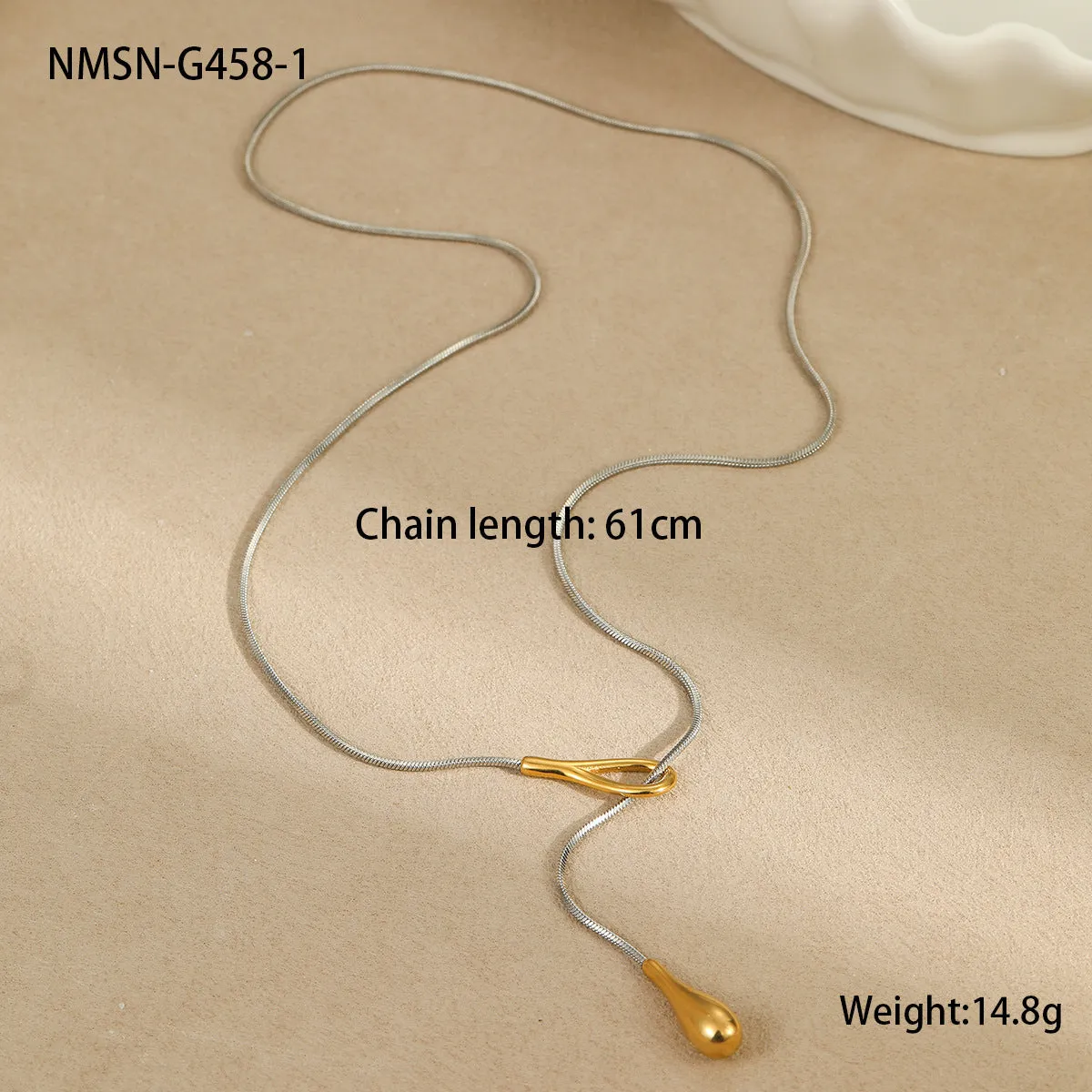 Stainless steel tassel water drop earrings with Y-word chain ornament in 18K gold electroplated finish, geometric drop-shaped design