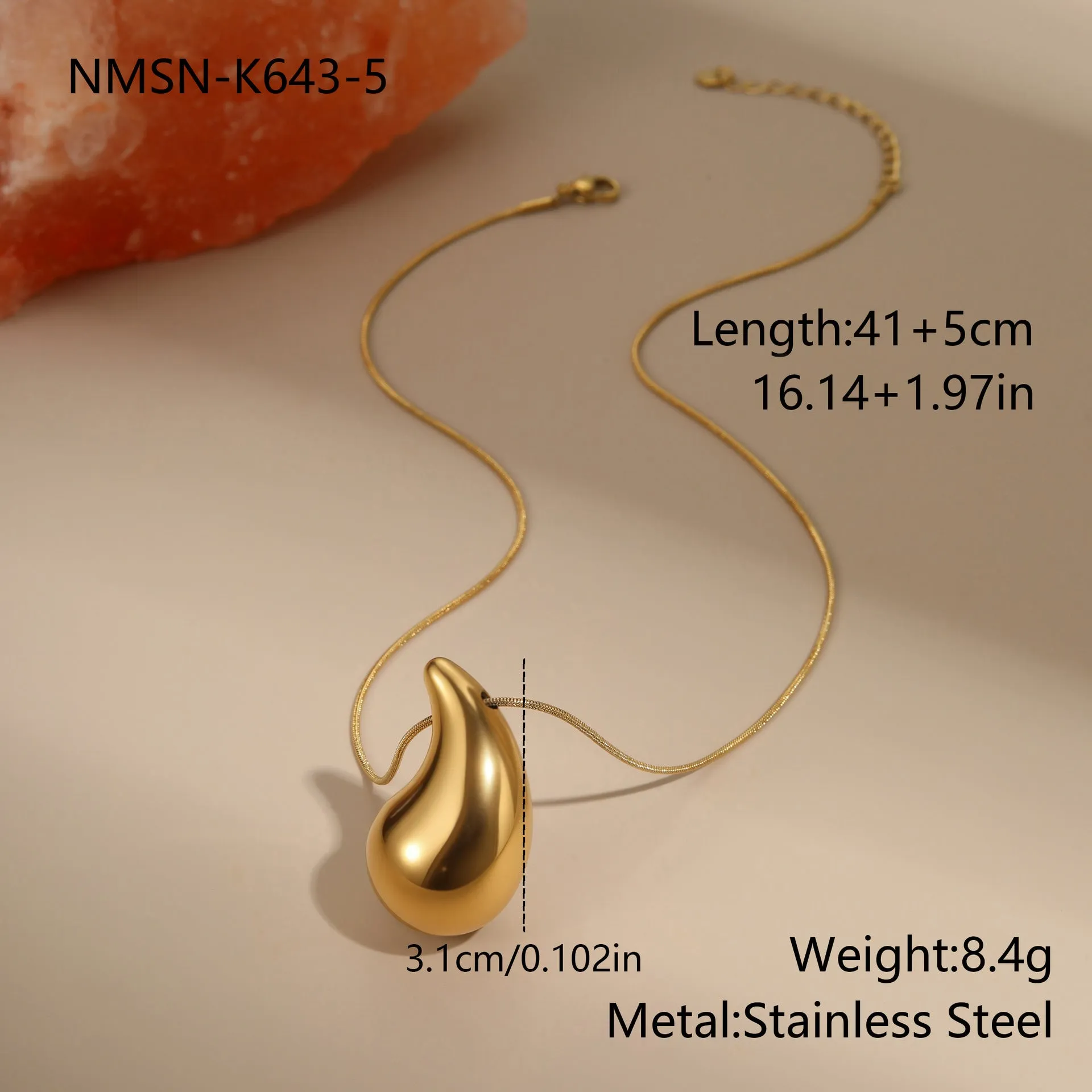 Stainless steel tassel water drop earrings with Y-word chain ornament in 18K gold electroplated finish, geometric drop-shaped design