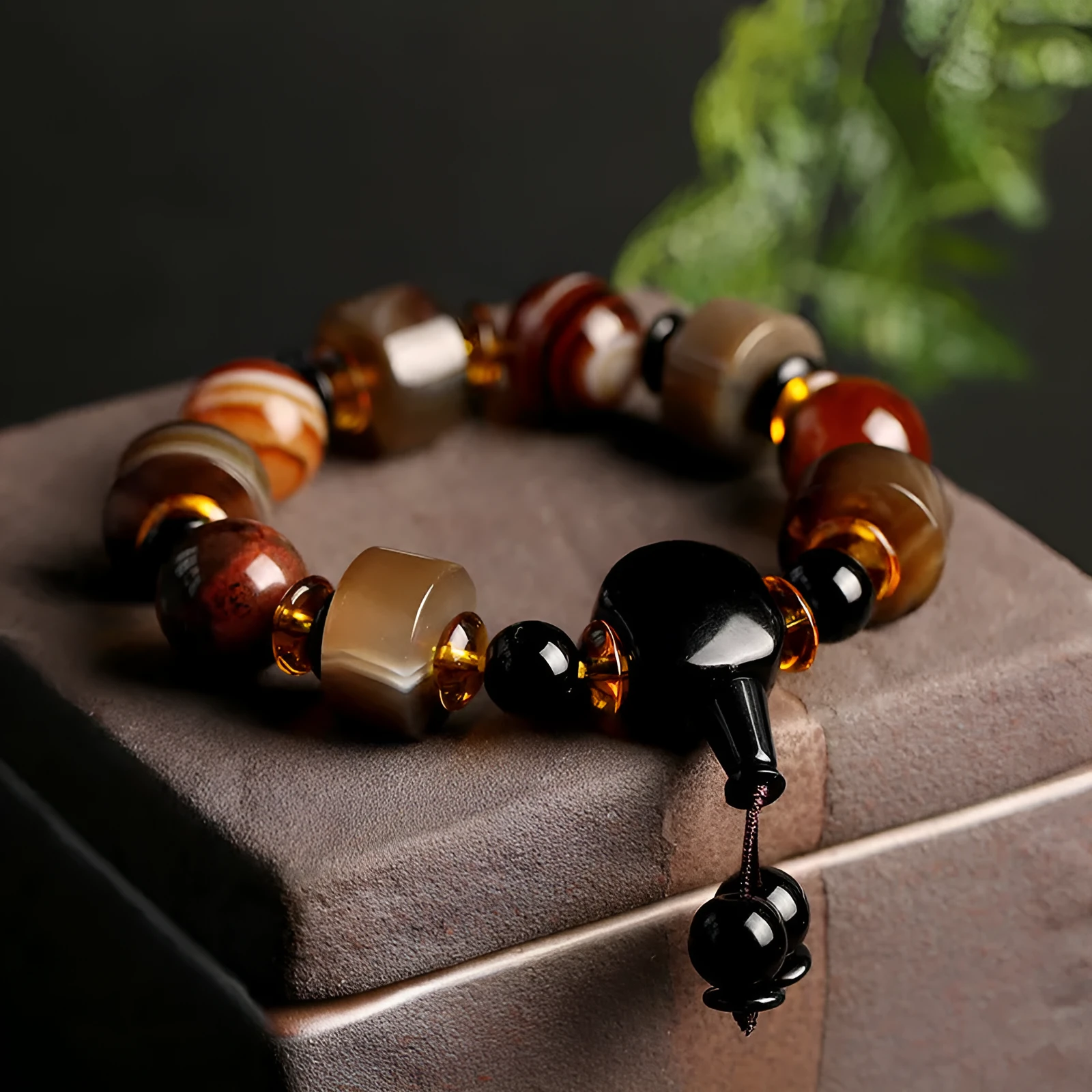 Old agate bracelet with A13 sardonyx bead, white agate spacers, and red agate barrel bead in geometric ethnic design