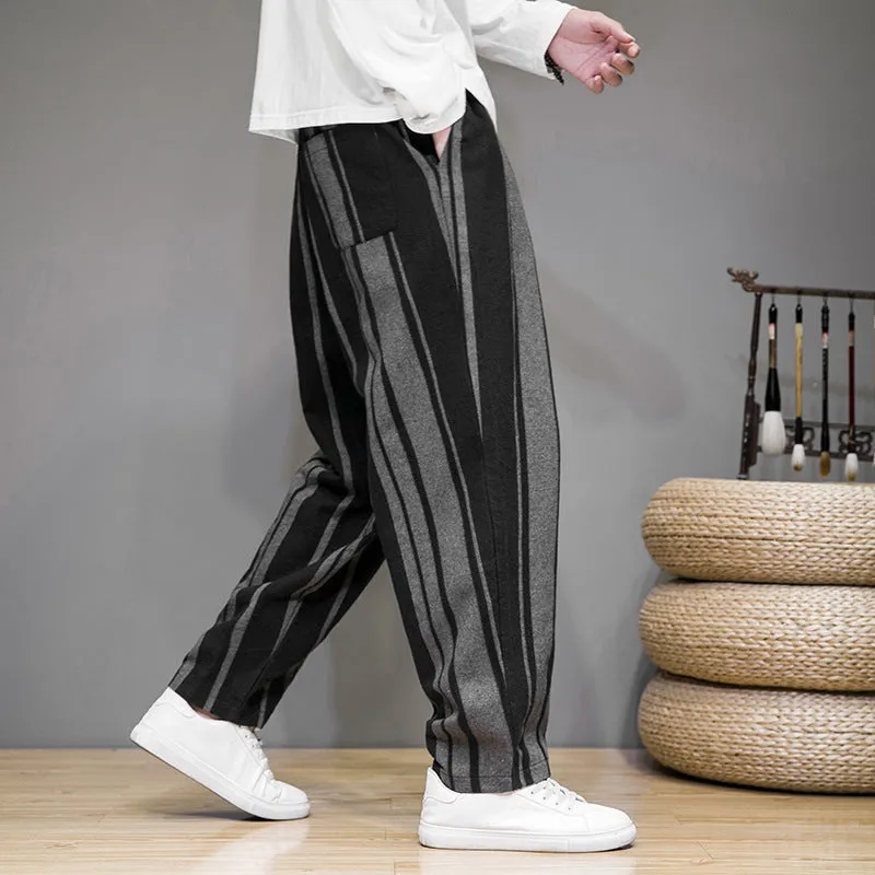 Men's striped casual trousers in black and navy blue options showing mid waist design