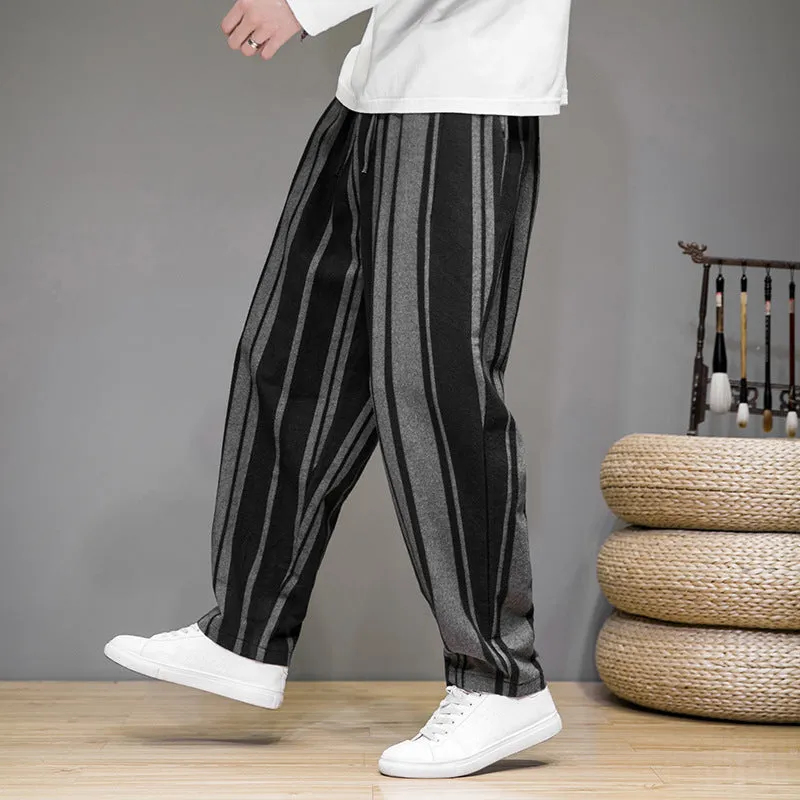 Men's striped casual trousers in black and navy blue options showing mid waist design