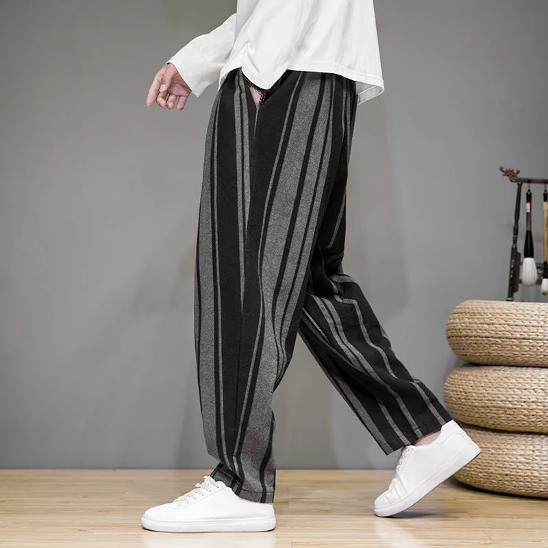 Men's striped casual trousers in black and navy blue options showing mid waist design