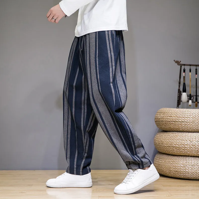 Men's striped casual trousers in black and navy blue options showing mid waist design