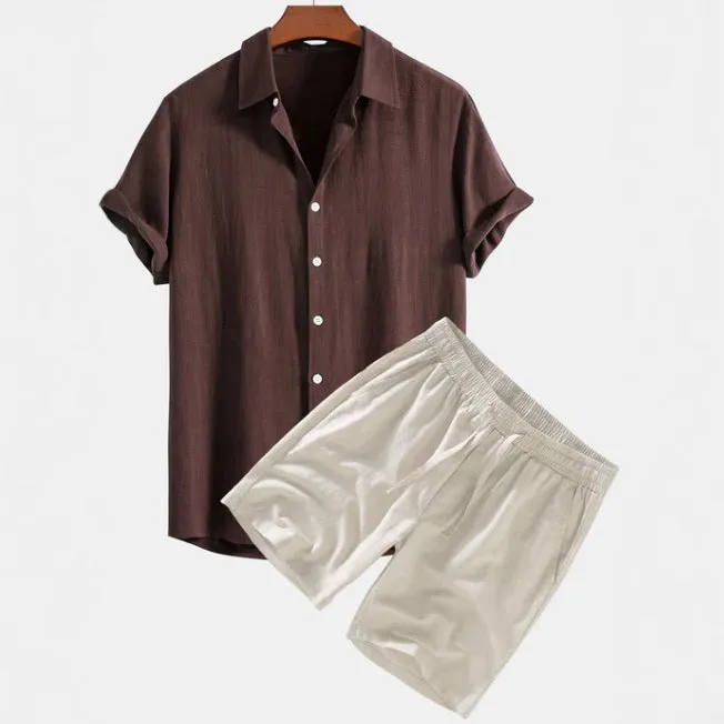 Men's solid colour casual short-sleeved shirt and shorts suit set on a hanger.
