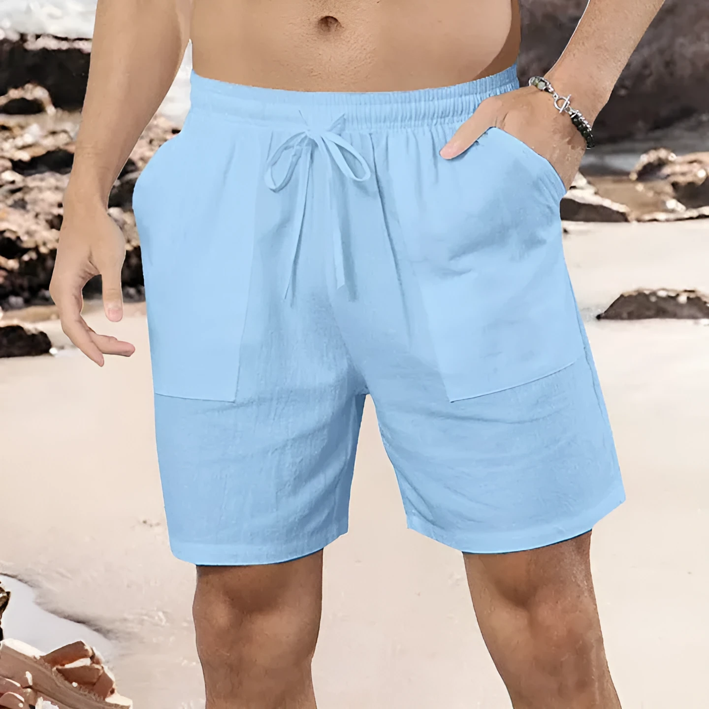 Men's light blue cotton linen straight-cut casual shorts on a hanger.