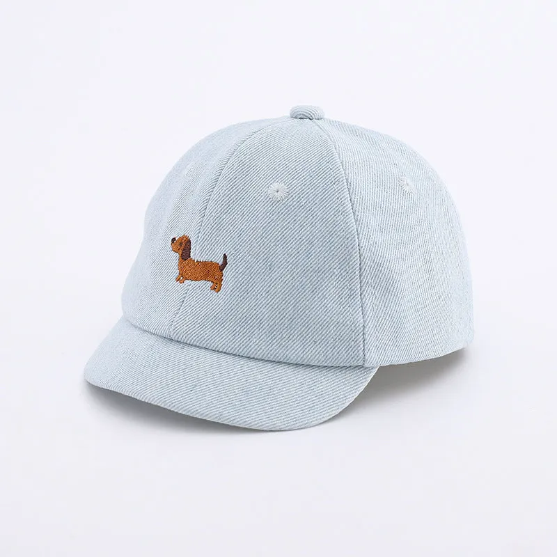 Denim puppy print baseball cap for babies with dome crown and short brim in black, dark blue, or light blue