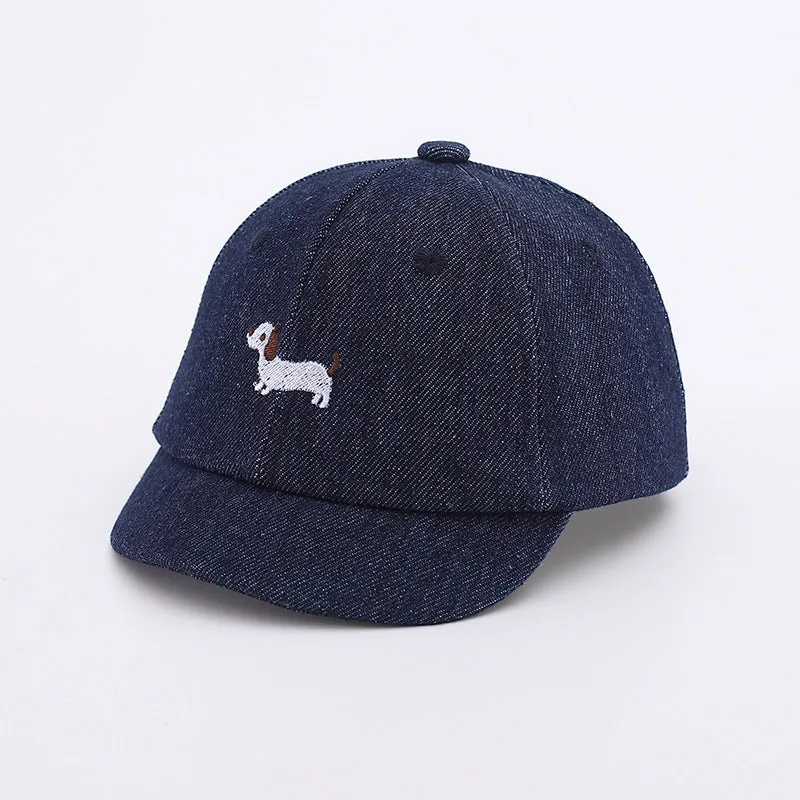 Denim puppy print baseball cap for babies with dome crown and short brim in black, dark blue, or light blue