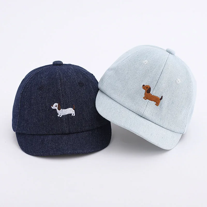 Denim puppy print baseball cap for babies with dome crown and short brim in black, dark blue, or light blue
