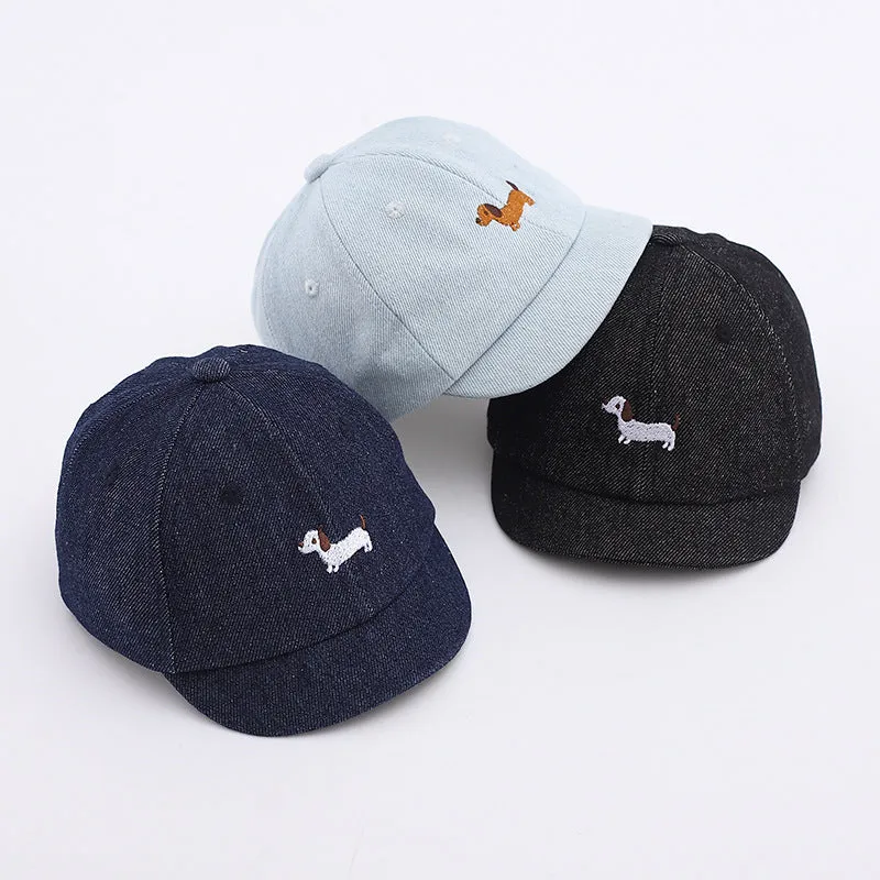 Denim puppy print baseball cap for babies with dome crown and short brim in black, dark blue, or light blue