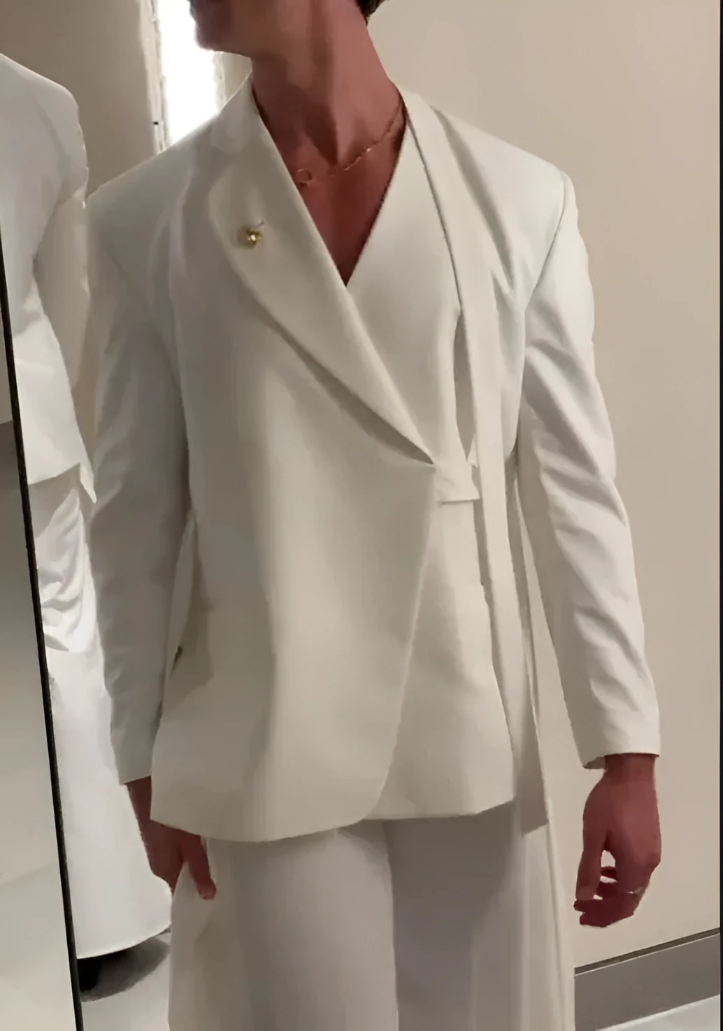 White modern draped collar suit set for women with blazer and straight leg trousers