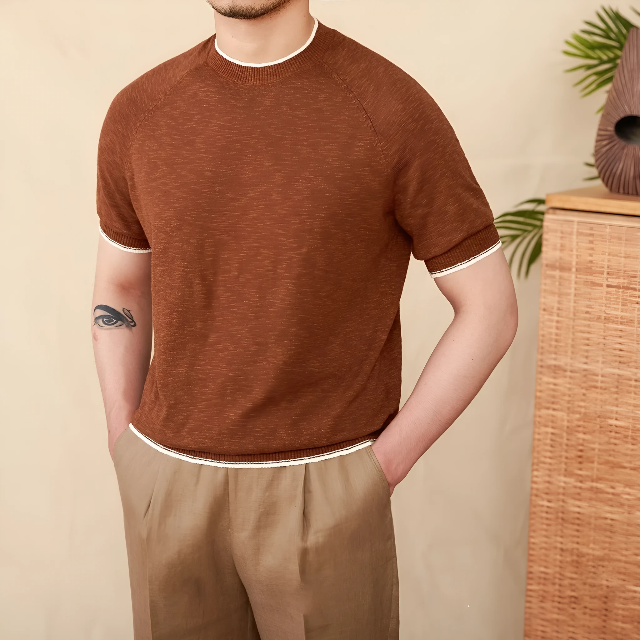 Brown linen cotton casual t-shirt with round neck and short sleeves on hanger