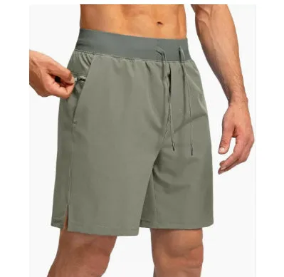 Men's loose nylon quick-dry sports shorts in black, side view, summer training wear
