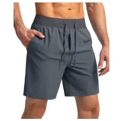 Men's loose nylon quick-dry sports shorts in black, side view, summer training wear