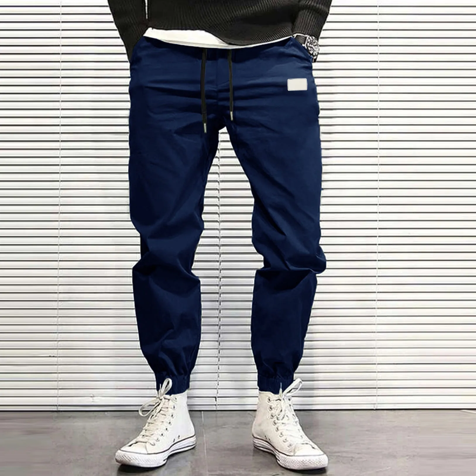 Loose fit quick-dry running trousers in polyester nylon blend, available in four colours and sizes M to XXXL