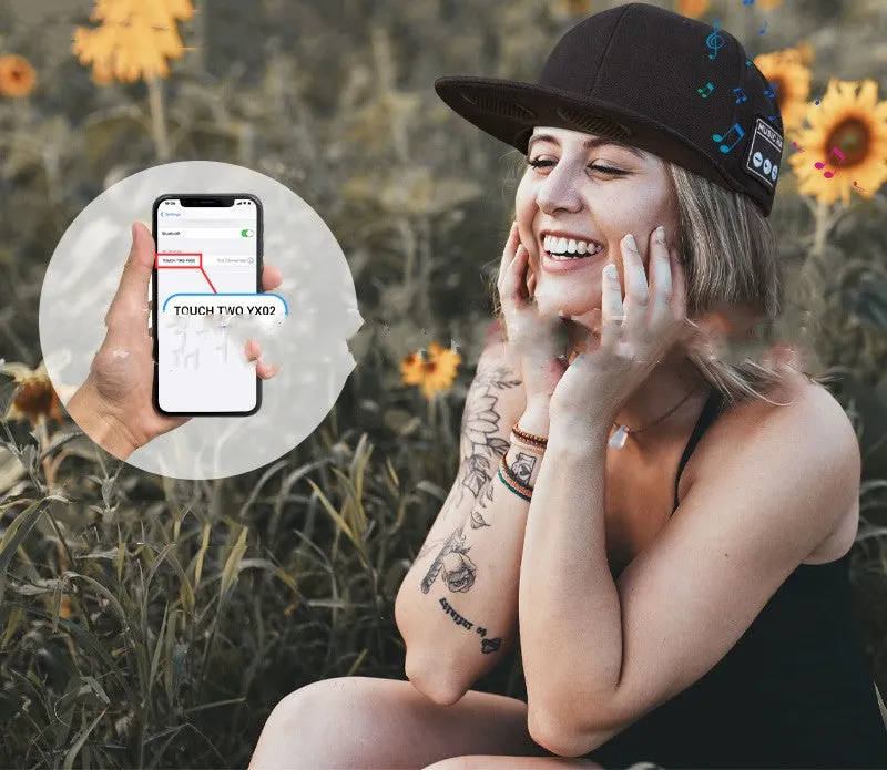 Wireless Bluetooth audio cap headphones in black with integrated side controls and fabric baseball cap design