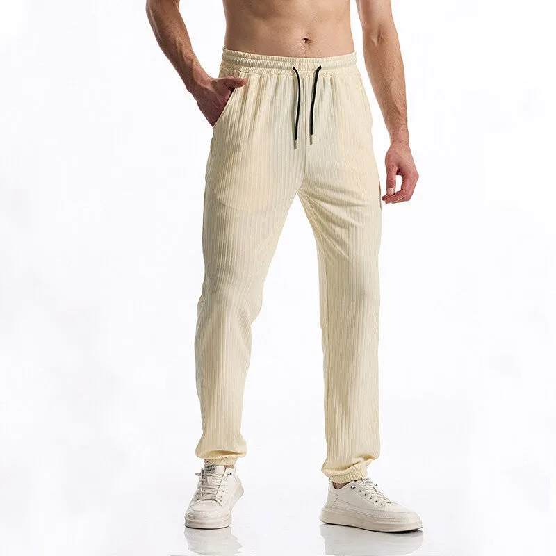 Silky rib fabric casual trousers with baggy straight-leg cut and elastic waistband