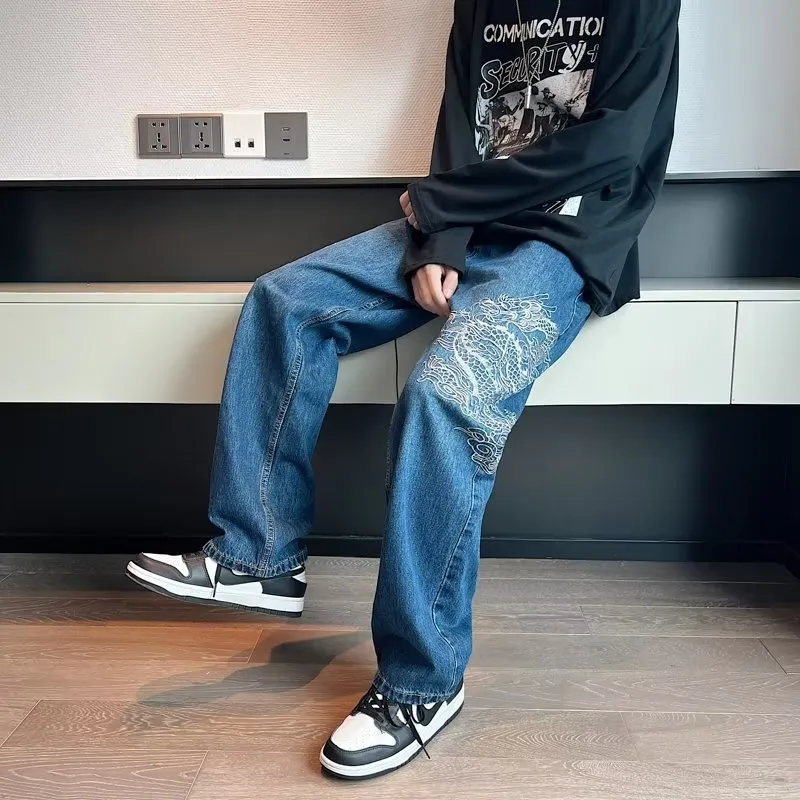 Loose embroidered jeans for men in Jinlong colour, cowboy style with three-dimensional tailoring, available in sizes S-3XL.