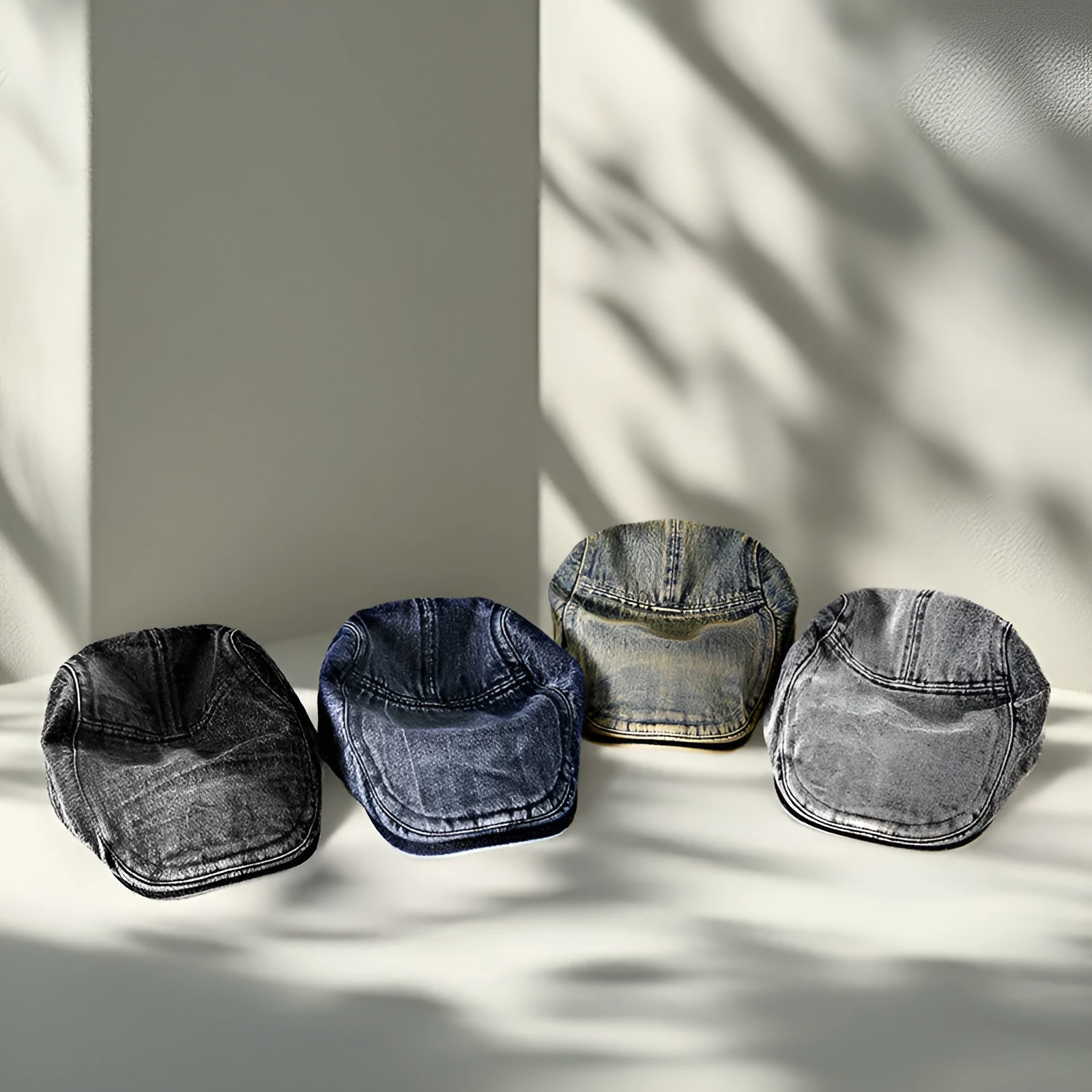 Men's flat top denim cap in wash-treated cotton fabric on a neutral background.