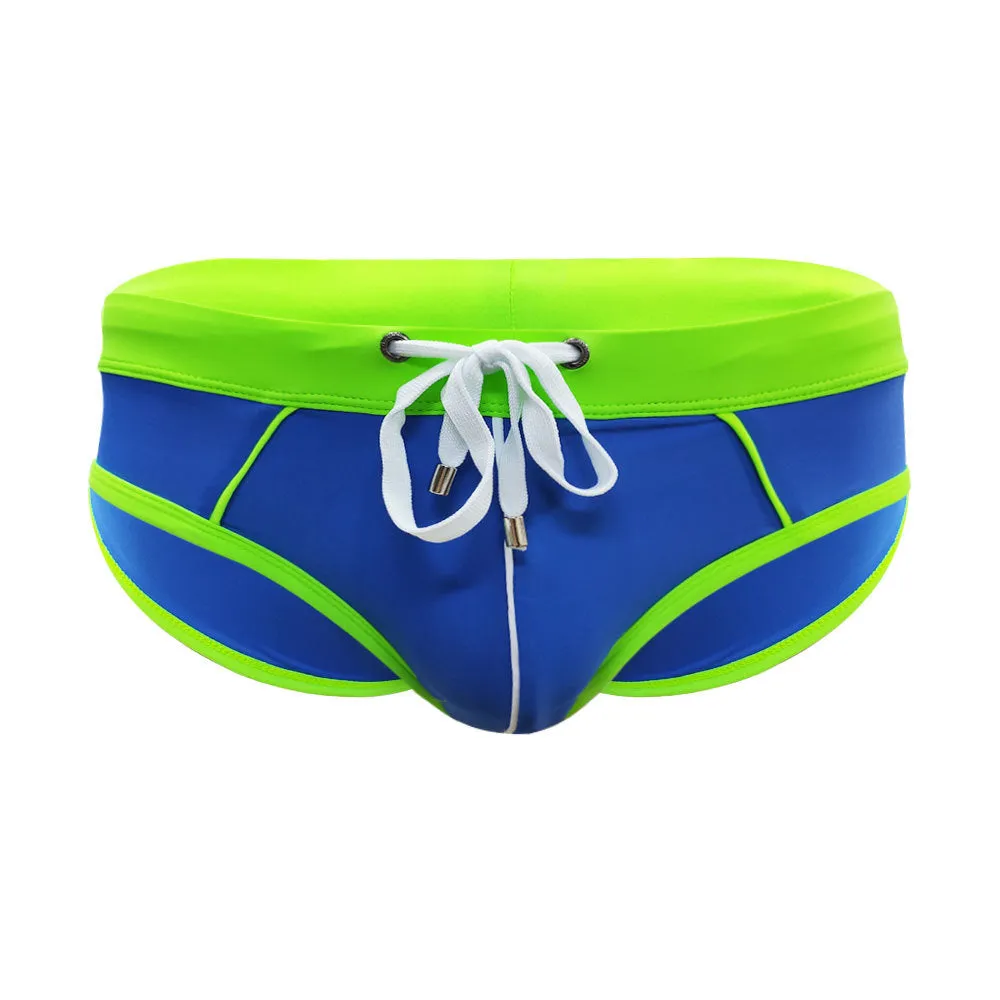 Nylon men's swim briefs in orange colour with elastic waistband, front view
