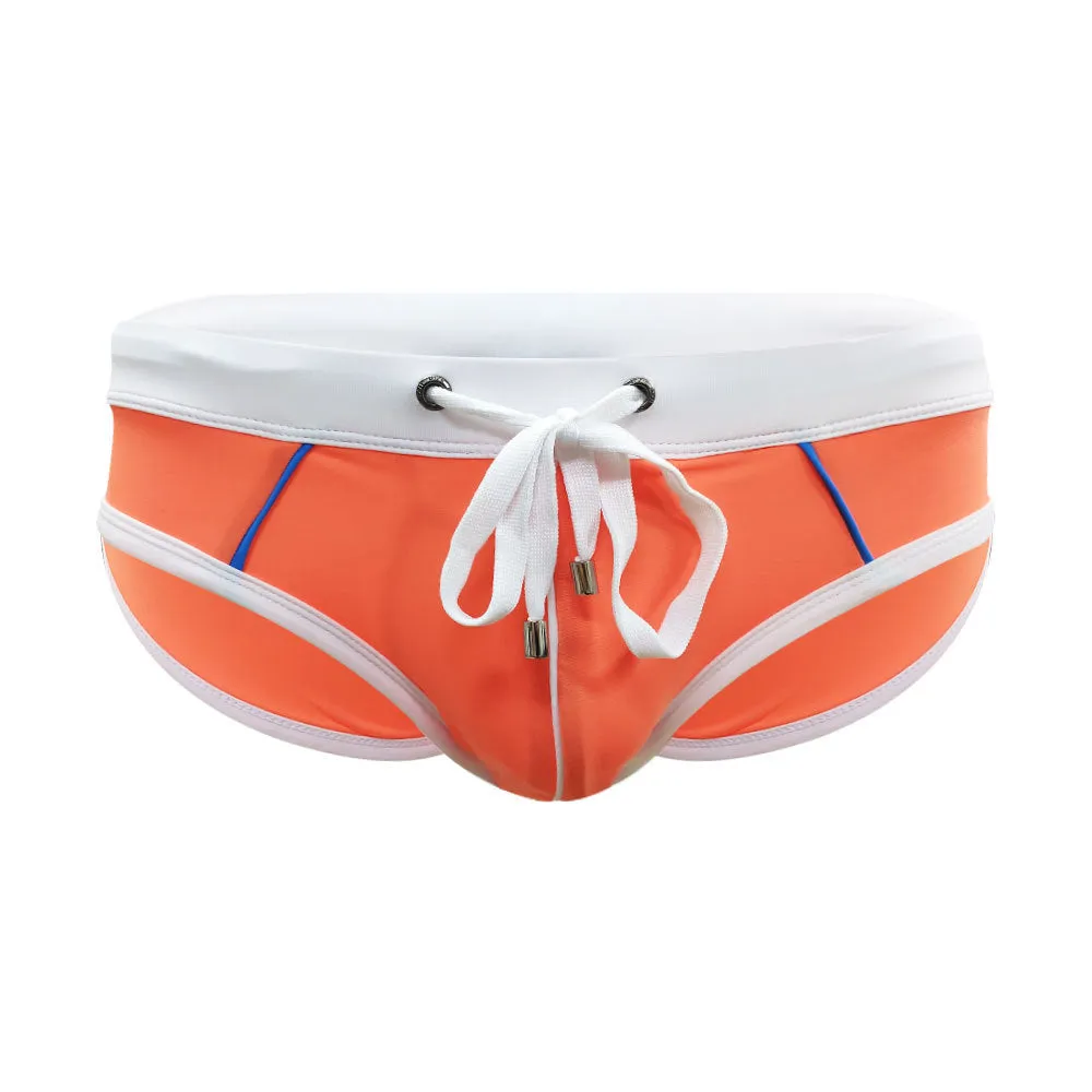 Nylon men's swim briefs in orange colour with elastic waistband, front view