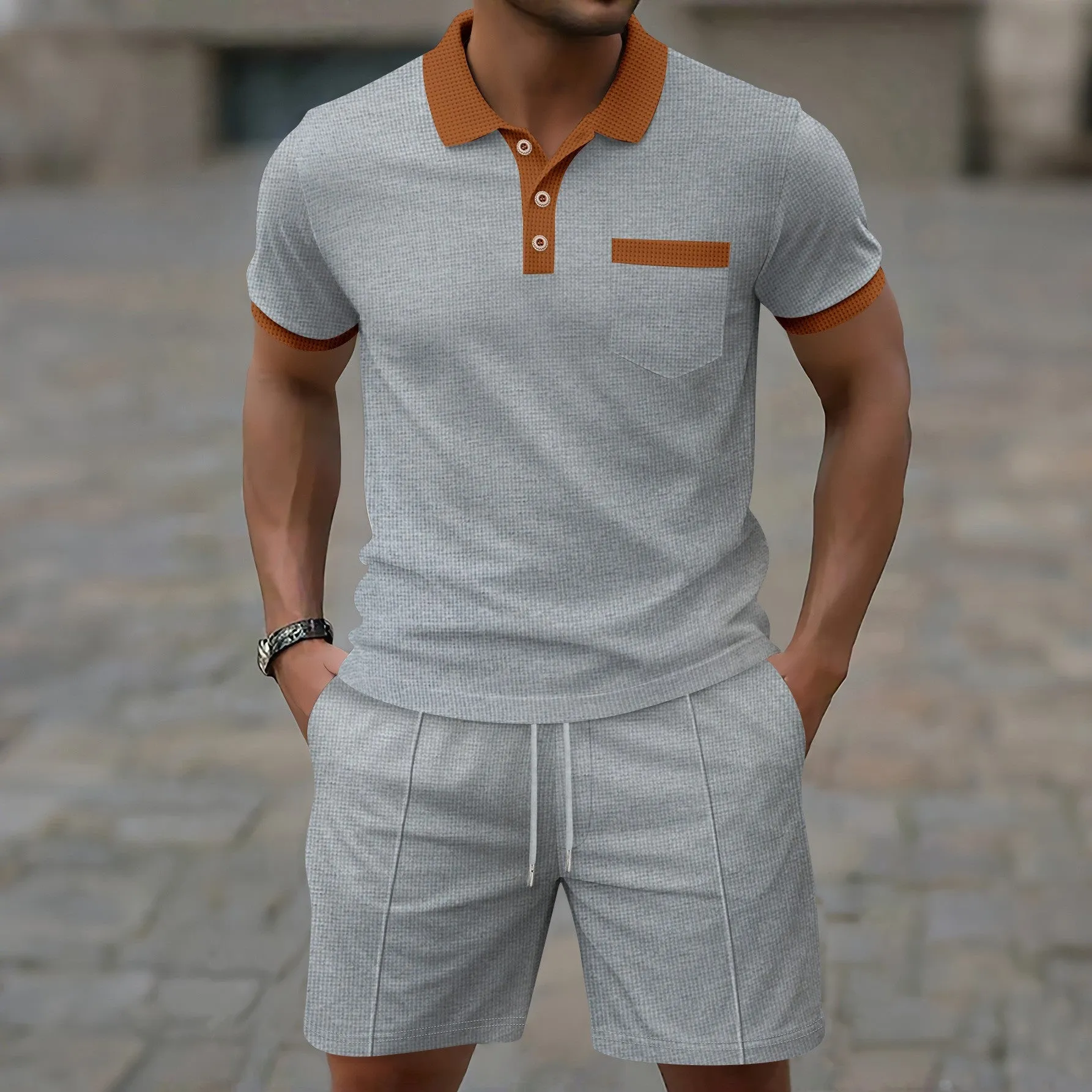Men's waffle lapel suit summer casual two-piece set in polyester fibre, showing front view of top and matching trousers.