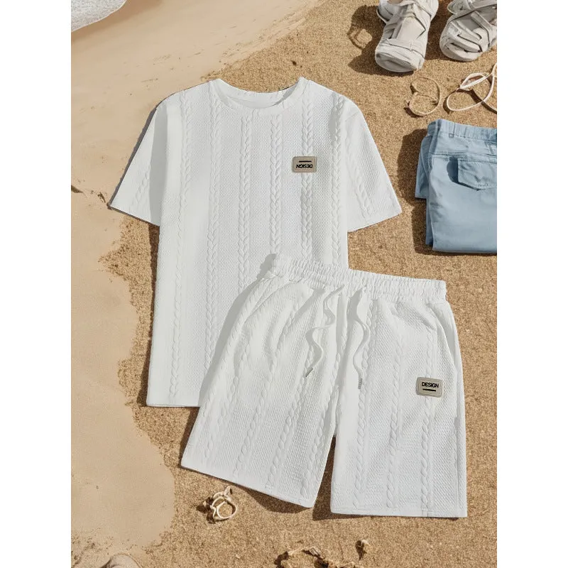 Men's wheat grain tassel knit two-piece set: grey hooded sweatshirt and matching shorts, front view on model