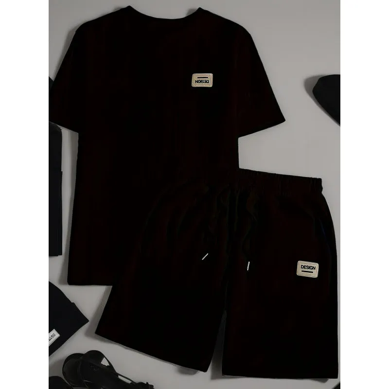 Men's wheat grain tassel knit two-piece set: grey hooded sweatshirt and matching shorts, front view on model