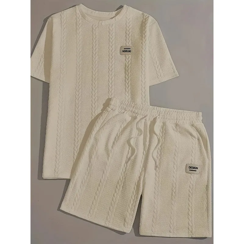 Men's wheat grain tassel knit two-piece set: grey hooded sweatshirt and matching shorts, front view on model
