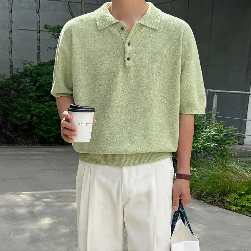 Men's caramel coloured retro knitted polo shirt with short sleeves and an asymmetrical design detail, laid flat.