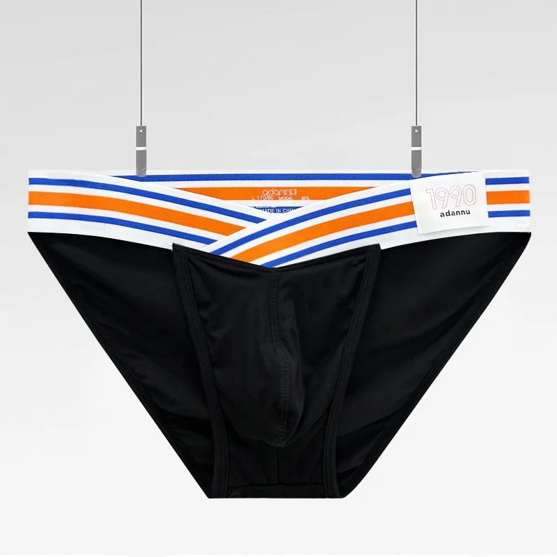 Solid color low waist cotton briefs for men with full package hip bulge design in black