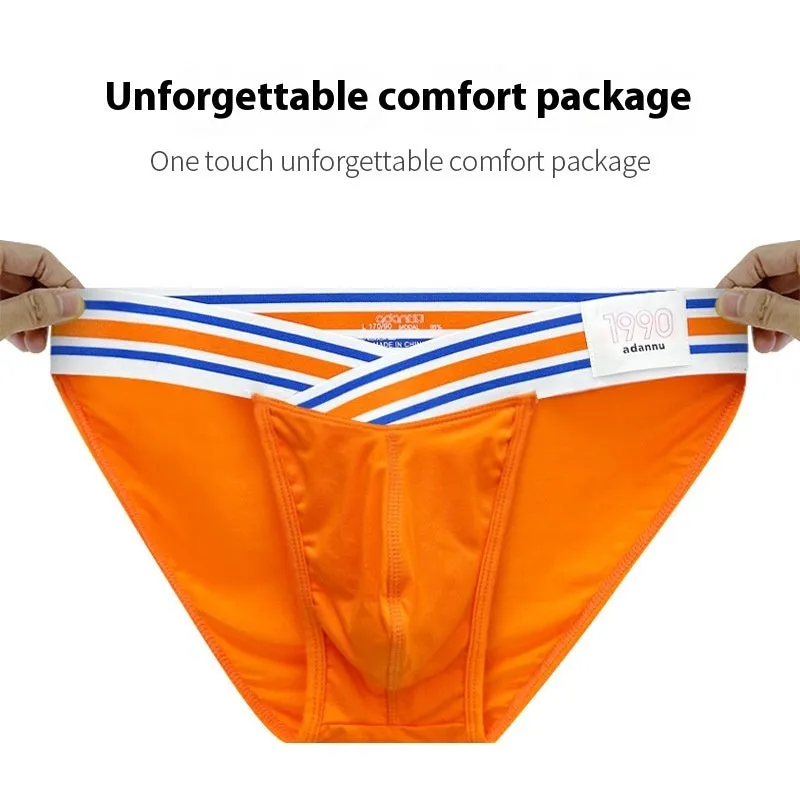 Solid color low waist cotton briefs for men with full package hip bulge design in black
