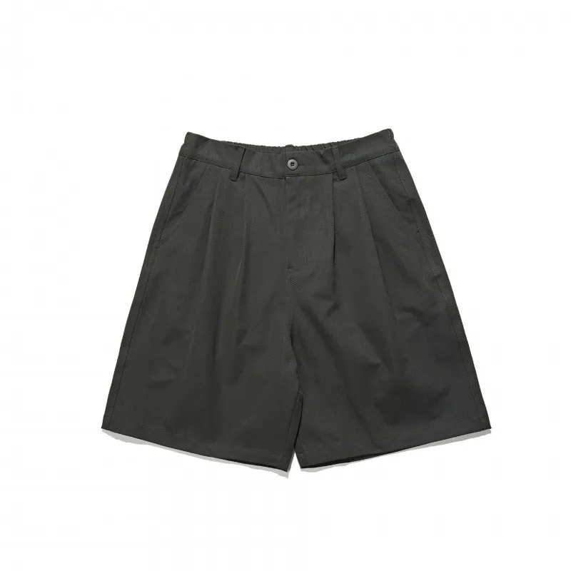 Loose straight drooping suit shorts in light grey, front view, with micro-elastic waist and retro style